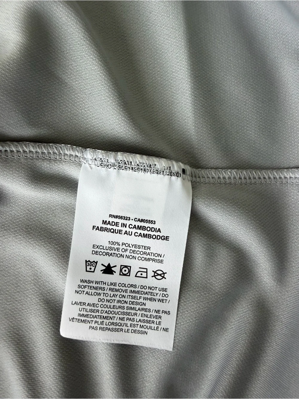 Nike Men’s Light Silver Gray Polo with White Swoosh